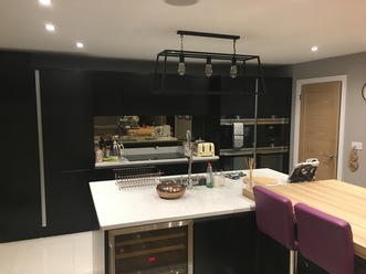 Matt Black handle free kitchen